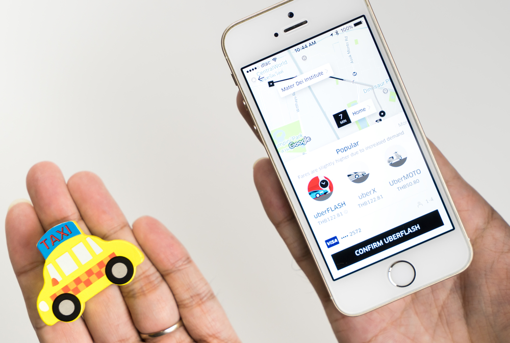 Photo of uber and taxi